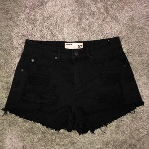 Women’s black ripped jean shorts